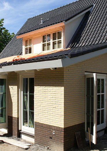 Aanbouw serre met terras en zwembad