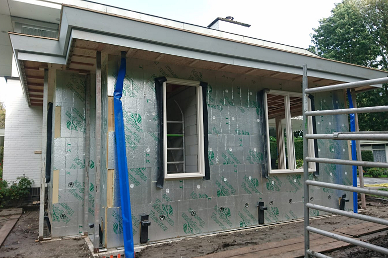Aanbouw slaapkamer en badkamer begane grond